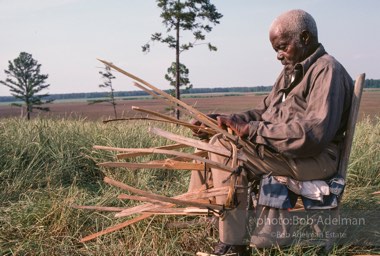 Preston Brown at work building one of his fish baskets - From the LIFE magazine story Artists of the Black Belt, 1983.