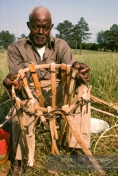 Preston Brown at work building one of his fish baskets - From the LIFE magazine story Artists of the Black Belt, 1983.