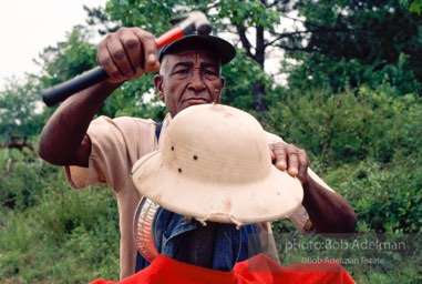 Keeps the crows away. - Scarecrow. From the LIFE magazine story Artists of the Black Belt, 1983.