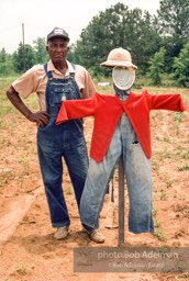 Keeps the crows away. - Scarecrow. From the LIFE magazine story Artists of the Black Belt, 1983. Keeps the crows away. - Scarecrow. From the LIFE magazine story Artists of the Black Belt, 1983.