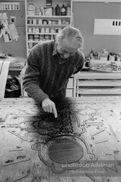 Roy Lichtenstein using Dremel tool onwoodcut for his 'Reflections on the Scream'. Tyler Graphics Studio, Mt. Kisco, NY. 1989. photo:©Bob Adelman Estate, Artwork©Estate of Roy Lichtenstein