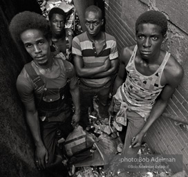 Out of work, out of luck, Harlem, New York City. 1963
ÒIn central Harlem at this time, an unemployment rate of one out of every four men was not uncommon. Limited
skills, poor schooling, racism, a downturn in the economy and the employersÕ preference for immigrants over blacks were some of the reasons these men were out of work. Often they squatted in abandoned buildings
and scavenged for survival. Neighbors might give them errands and little jobs to do in exchange for a meal.
Grinding poverty forced many men like these into despair, substance abuse, crime, apathy and rage.Ó Out of work, out of luck, Harlem, New York City. 1963
ÒIn central Harlem at this time, an unemployment rate of one out of every four men was not uncommon. Limited
skills, poor schooling, racism, a downturn in the economy and the employersÕ preference for immigrants over blacks were some of the reasons these men were out of work. Often they squatted in abandoned buildings
and scavenged for survival. Neighbors might give them errands and little jobs to do in exchange for a meal.
Grinding poverty forced many men like these into despair, substance abuse, crime, apathy and rage.Ó