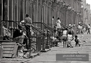 The Bedford Stuyvesant ghetto,  Brooklyn,  New York City.  1963

“As difficult as the Bed Stuy street might look, it was
teeming with life. Twenty years later, I went back and
the neighborhood had fallen apart. All the buildings were
boarded up and deserted.”