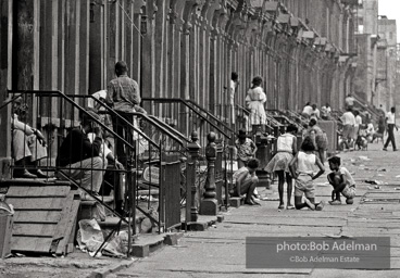 The Bedford Stuyvesant ghetto, Brooklyn, New York City. 1963
“As difficult as the Bed Stuy street might look, it was
teeming with life. Twenty years later, I went back and
the neighborhood had fallen apart. All the buildings were
boarded up and deserted.” The Bedford Stuyvesant ghetto, Brooklyn, New York City. 1963
“As difficult as the Bed Stuy street might look, it was
teeming with life. Twenty years later, I went back and
the neighborhood had fallen apart. All the buildings were
boarded up and deserted.”