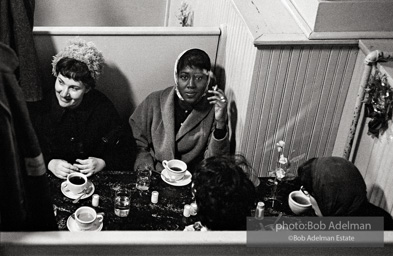 They sometimes served those who only sat and waited, Integrated group in a restaurant booth, Route 40 between Baltimore and Washington, D.C. 1962