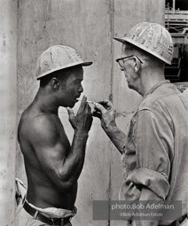 No matches, no matter:  a construction site,  New York City.  1963