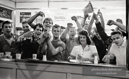 White Knights defend their White Castle as picketers outside demand fair employment practices, Bronx, New York City. 1963 White Knights defend their White Castle as picketers outside demand fair employment practices, Bronx, New York City. 1963