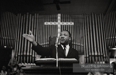 During a mass meeting at the 16th Street Baptist Church, King urges his supporters to join the demonstrations,  Birmingham,  Alabama.  1963