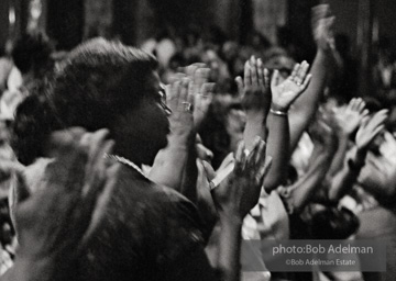 Audience responding to Martin Luther King speaking at the 16th street Baptist Church. Birmingham, Alabama, 1963.