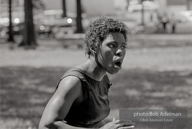 Hell, no!: A downed onlooker rises up enraged, It was often difficult for firemen to distinguish between protesters and bystanders. Consequently innocent people were sometimes hosed down.  Birmingham,  Alabama.  1963