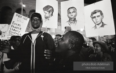 Nighttime demonstration in support of the Mississippi Freedom Democratic Party, with images of slain civil rights workers Schwerner, Chaney and Goodman, Atlantic City, NJ 1964