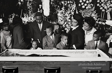 Members of King’s family, including his wife and children, view his body as it lies in state,  Atlanta, Georgia.  1968-


“The King family had had to share him with the world all his life, and now he was finally home. He once voiced how he wished to be remembered and those words resonated at his funeral. ‘I’d like someone to mention that I tried to be right on the war question … that I did try to feed the hungry … that I did try, in my life, to clothe those who were naked … that I did try, in
my life, to visit those who were in prison … that I tried to love and serve humanity.’”