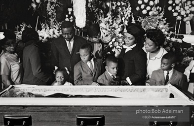 Members of King’s family, including his wife and children, view his body as it lies in state, Atlanta, Georgia. 1968-
“The King family had had to share him with the world all his life, and now he was finally home. He once voiced how he wished to be remembered and those words resonated at his funeral. ‘I’d like someone to mention that I tried to be right on the war question … that I did try to feed the hungry … that I did try, in my life, to clothe those who were naked … that I did try, in
my life, to visit those who were in prison … that I tried to love and serve humanity.’” Members of King’s family, including his wife and children, view his body as it lies in state, Atlanta, Georgia. 1968-
“The King family had had to share him with the world all his life, and now he was finally home. He once voiced how he wished to be remembered and those words resonated at his funeral. ‘I’d like someone to mention that I tried to be right on the war question … that I did try to feed the hungry … that I did try, in my life, to clothe those who were naked … that I did try, in
my life, to visit those who were in prison … that I tried to love and serve humanity.’”