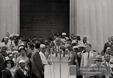 A. Phillip Randolph, director of the March on Washington. Randolph gives the opening remarks. Since the begining of WWII it was Randolph's idea that a massive march to protest the unfair treatment of African Americans come to Washington. 