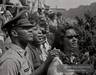 Listeners attentivly hear Martin Luther King Jr.'s opening remarks. Servicemen who had served in an integrated military were an important source of support for
the Movement.