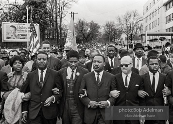 Dr. King leads a protest march around the state capital in Montgomery Alabama protesting the treatment of black demonstrators and voter applicants in Selma, Alabama prior to the Selma to Montgomery march. Montgomery, Alabama. 1965. Dr. King leads a protest march around the state capital in Montgomery Alabama protesting the treatment of black demonstrators and voter applicants in Selma, Alabama prior to the Selma to Montgomery march. Montgomery, Alabama. 1965.