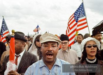 King and Coretta Scott King arriving outside Montgomery on the fourth day of the Selma to Montgomery March. Alabama Route 80. 1965.