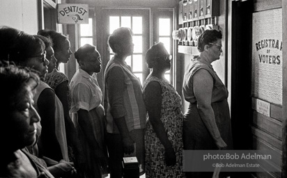 A study in impatient patience, voter applicants line up then wait — and wait and wait — to register,  Registrar of Voters office, Clinton, East Feliciana Parish, LA 1964