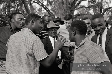 Neighbors and civil rights workers gather to congratulate Carter and hear about his historic breakthrough, West Feliciana Parish, Louisiana. 1964 Neighbors and civil rights workers gather to congratulate Carter and hear about his historic breakthrough, West Feliciana Parish, Louisiana. 1964