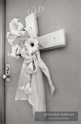 Door of King’s room at the Lorraine Motel with flowers, Memphis 1968.