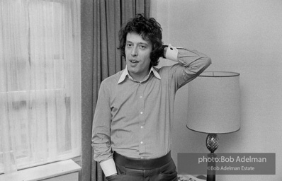 Tom Stoppard at his hotel room in New York City during the Broadway production of his play TRAVESTIES, Ethel Barrymore Theatre, 1976.