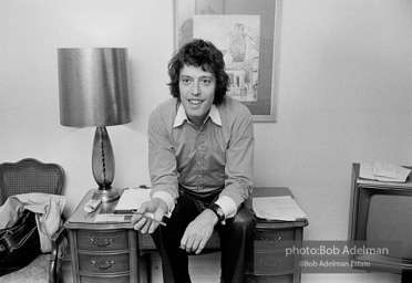 Tom Stoppard at his hotel room in New York City during the Broadway production of his play TRAVESTIES, Ethel Barrymore Theatre, 1976.