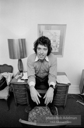 Tom Stoppard at his hotel room in New York City during the Broadway production of his play TRAVESTIES, Ethel Barrymore Theatre, 1976.