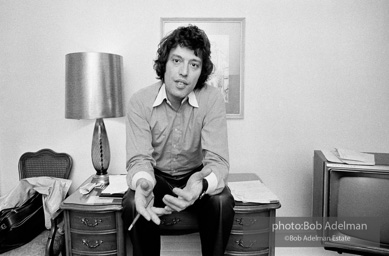Tom Stoppard at his hotel room in New York City during the Broadway production of his play TRAVESTIES, Ethel Barrymore Theatre, 1976.