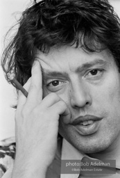 Tom Stoppard at his hotel room in New York City during the Broadway production of his play TRAVESTIES, Ethel Barrymore Theatre, 1976.
