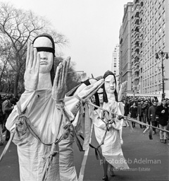 Marchers and onlookers, both for and against the war in Vietnam. Near Central Park in New York City. Marchers and onlookers, both for and against the war in Vietnam. Near Central Park in New York City.