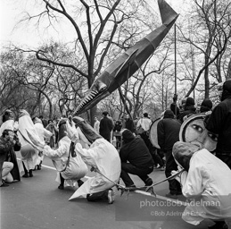 Marchers and onlookers, both for and against the war in Vietnam. Near Central Park in New York City. Marchers and onlookers, both for and against the war in Vietnam. Near Central Park in New York City.