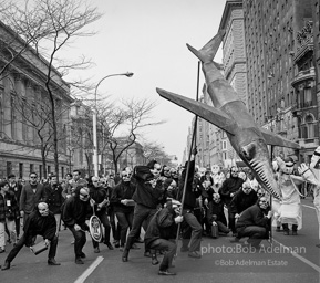 Marchers and onlookers, both for and against the war in Vietnam. Near Central Park in New York City. Marchers and onlookers, both for and against the war in Vietnam. Near Central Park in New York City.