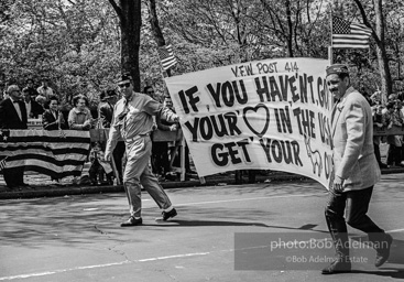 Marchers and onlookers, both for and against the war in Vietnam. Near Central Park in New York City. Marchers and onlookers, both for and against the war in Vietnam. Near Central Park in New York City.