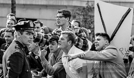 Marchers and onlookers, both for and against the war in Vietnam. Near Central Park in New York City. Marchers and onlookers, both for and against the war in Vietnam. Near Central Park in New York City.