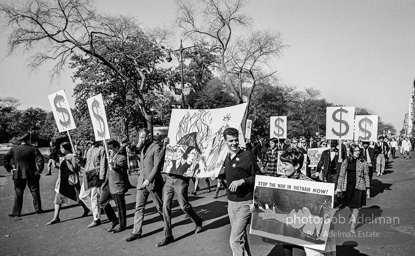 Marchers and onlookers, both for and against the war in Vietnam. Near Central Park in New York City. Marchers and onlookers, both for and against the war in Vietnam. Near Central Park in New York City.