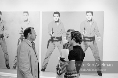 Andy Warhol and Gerard Melanga at the Leo Castelli Gallery. New York City, 1965.