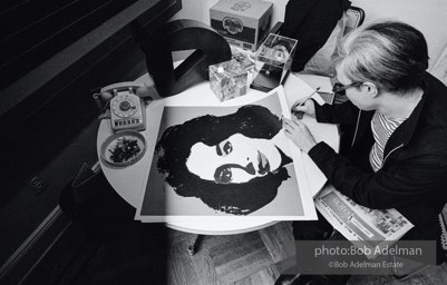 Andy Warhol signs his Liz Taylor prints at the Leo Castelli Gallery. New York City, 1965. Andy Warhol signs his Liz Taylor prints at the Leo Castelli Gallery. New York City, 1965.