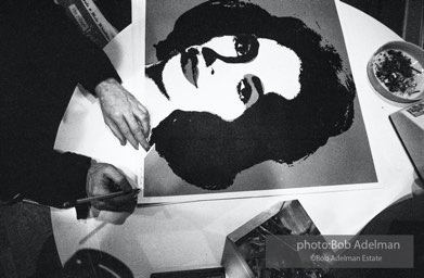Andy Warhol signs his Liz Taylor prints at the Leo Castelli Gallery. New York City, 1965. Andy Warhol signs his Liz Taylor prints at the Leo Castelli Gallery. New York City, 1965.