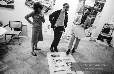 Kay Bearman, Andy Warhol and Ivan Karp at the Leo Castelli Gallery. New York City, 1965.