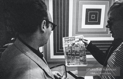 Andy Warhol and Ivan Karp at the Leo Castelli Gallery. New York City, 1965.