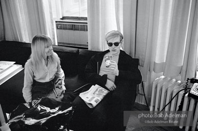 Bibbe Hanson and Andy Warhol ,with Campbell's soup can, at the Leo Castelli Gallery. New York City, 1965.