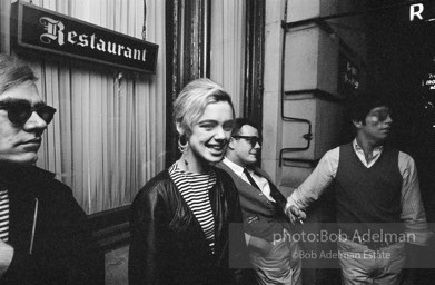 Andy Warhol and  entourage late at night outside a NYC night club, 1865