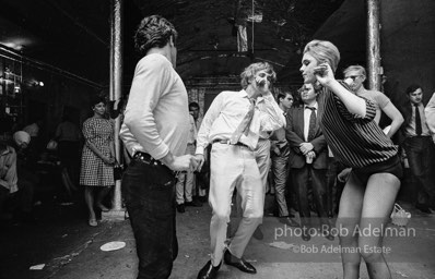 Gerard Melanga, Chuck Wein and Edie Sedgwick dance at a party at Warhol's Factory. New York City, 1965.
