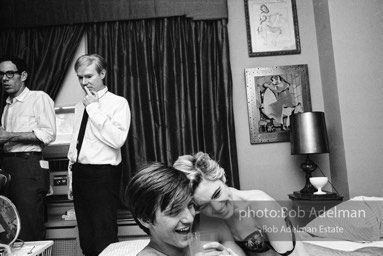 Andy Warhol while preparing the set in a New York City apartment for the film Beauty #2. 1965.