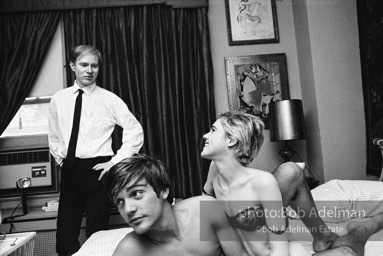 Andy Warhol while preparing the set in a New York City apartment for the film Beauty #2. 1965.