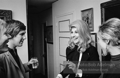 Andy Warhol, Chuck Wein, Baby Jane Holzer and Edie Sedgwick at a society party. New York City, 1965.