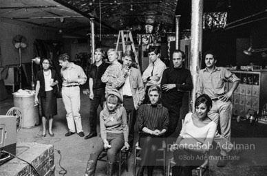 Film screening at the Factory. Standing, left to right: Unknown, Unknown, Chuck Wein, Andy Warhol, Unknown, Stephen Shore, Unknown, Unknown. Sitting, left to right: Bibbe Hansen, EdieSedgwick, Pat Hartley. The Factory, 1965.