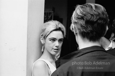 Andy Warhol and Edie Sedgwick at a party in New York City, 1965.