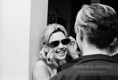 Andy Warhol and Edie Sedgwick at a party in New York City, 1965.