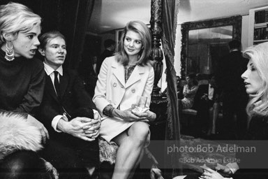 Edie Sedgwick, Andy Warhol and Baby Jane Holzer (right) at a society party. New York City, 1965.